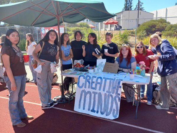 Creative Minds Club’s at their table during  the first Club Day of the 24-25 school year