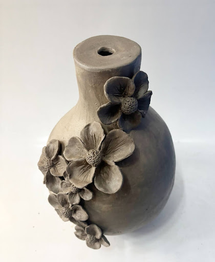 Ms. Entwood's ceramics classes are always up to something fun, but as we end the school year, here are a few outstanding pieces from her students!