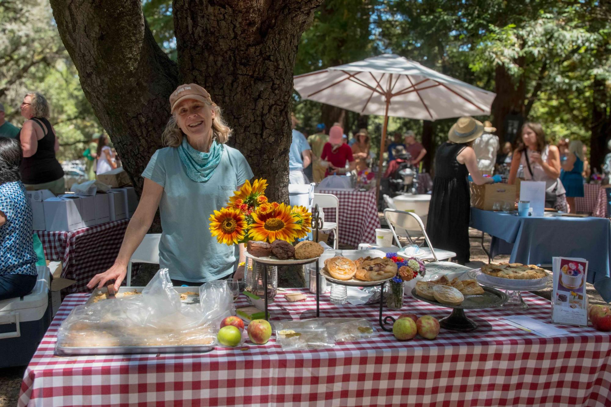 Sharon R. at the Patisserie Angelica table in the Artisan Tasting Grove.