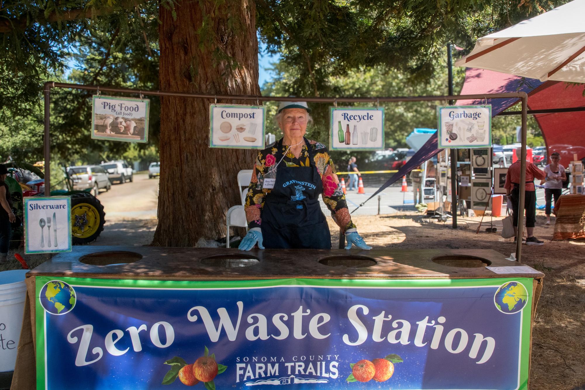 Mary Anna Maloney at one of the many Zero Waste Stations located around the Gravenstein Apple Fair.